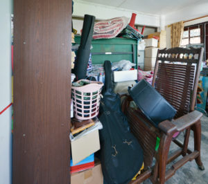Messy storage room in garage for junk in old house Messy Garage